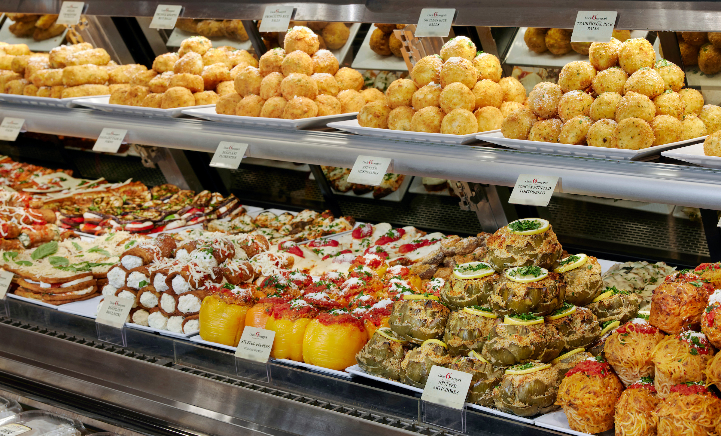 The Uncle Giuseppe's family behind the counter